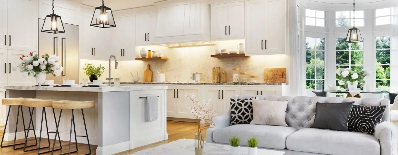 Luxury modern kitchen renovation in Calgary featuring custom white cabinetry, marble countertops, and stainless steel appliances by Can Do More Renovations