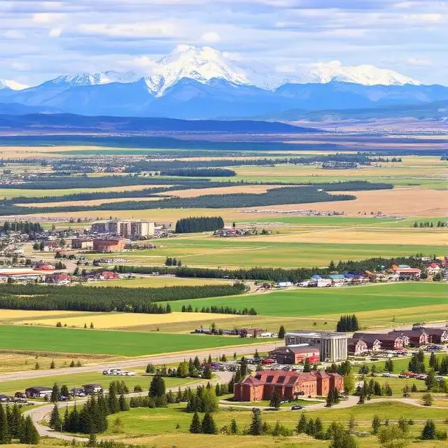 Main street Okotoks with heritage storefronts reflecting Can Do More Renovations service presence