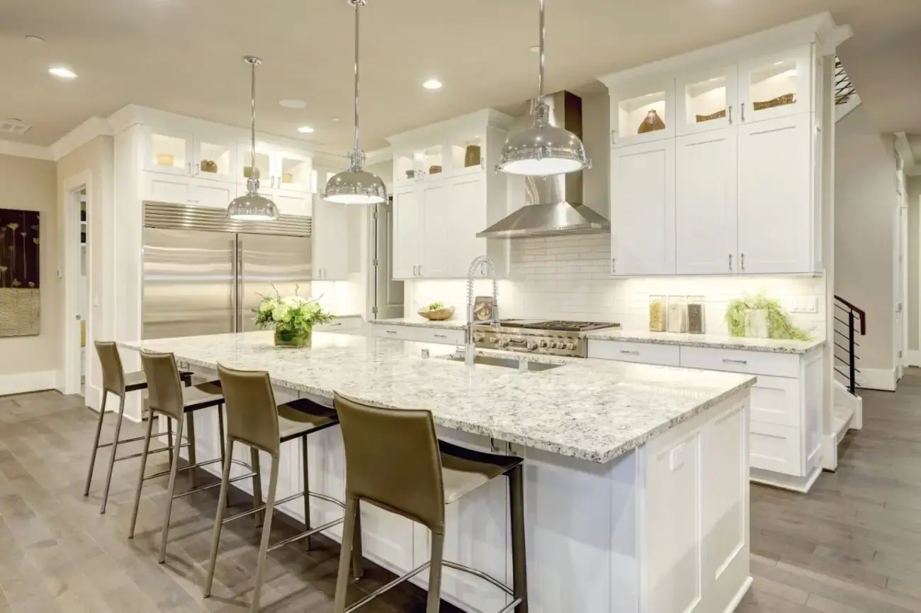 Contemporary kitchen renovation with quartz countertops and premium finishes